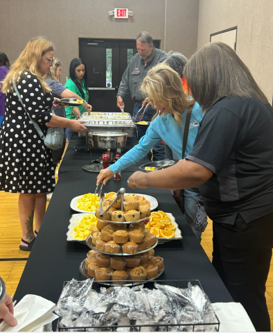 People grabbing breakfast
